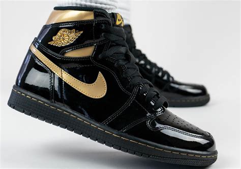 all black jordans with gold